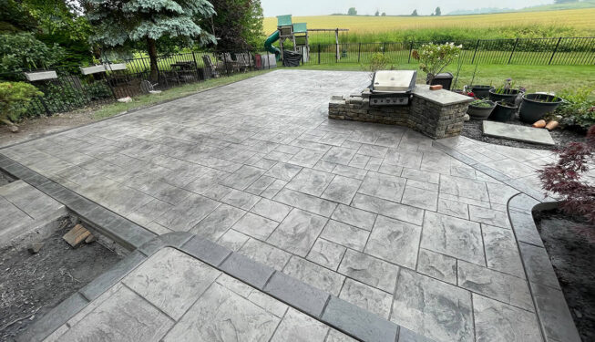 Pattern: Majestic Ashlar Slate - Colors: Hailstorm gray with charcoal and charcoal border