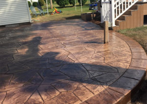 Pattern: Large Random Flagstone - Colors: Hiltop Tan With Walnut And Autumn Brown Border