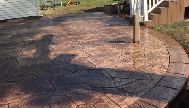 Pattern: Large Random Flagstone - Colors: Hiltop Tan With Walnut And Autumn Brown Border